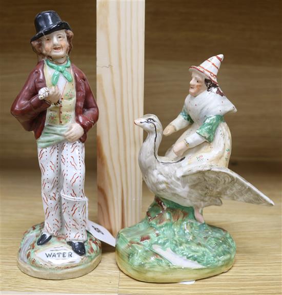 A Staffordshire double Gin and Water figure and another of a witch riding a goose